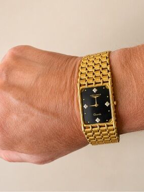 Vintage Longines Gold-Tone Bracelet Watch with Black Dial and Diamond Markers